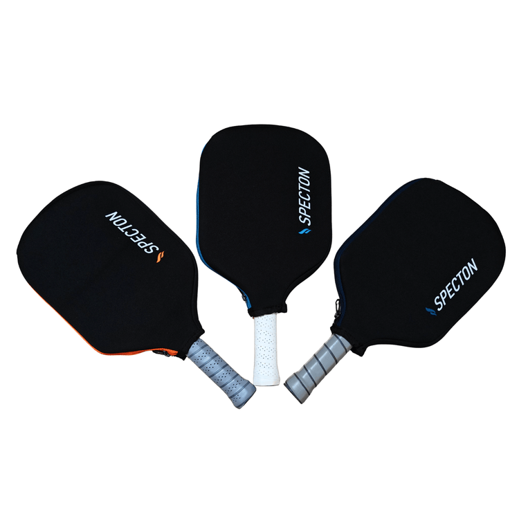 Three Specton pickleball paddle covers in orange, blue and navy blue colours