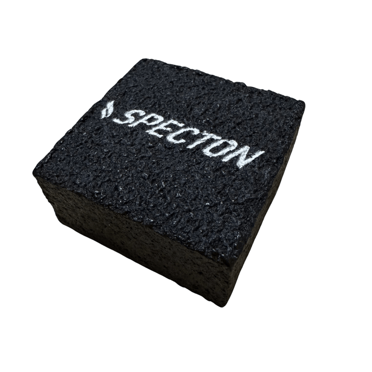 Angled view of Specton Carbon Eraser designed for cleaning carbon fiber pickleball paddle surfaces
