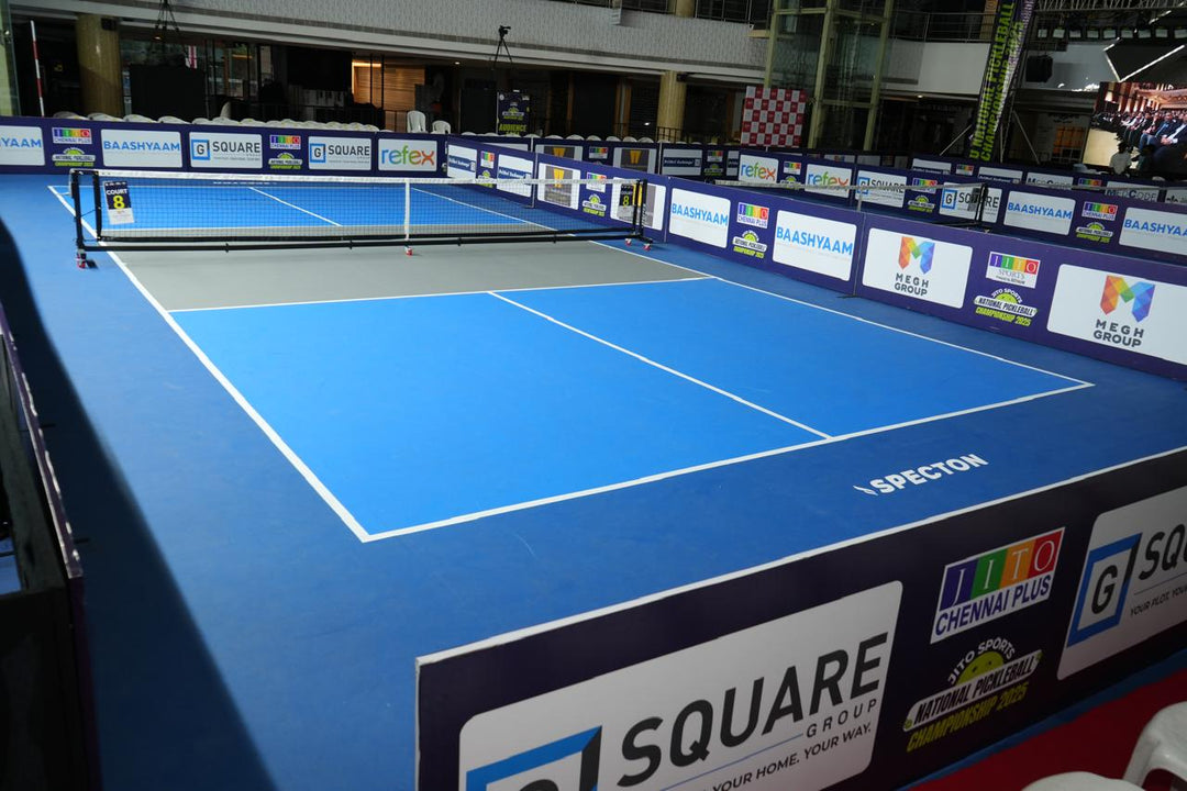 Specton rollable pickleball court mat installed in a professional indoor tournament venue